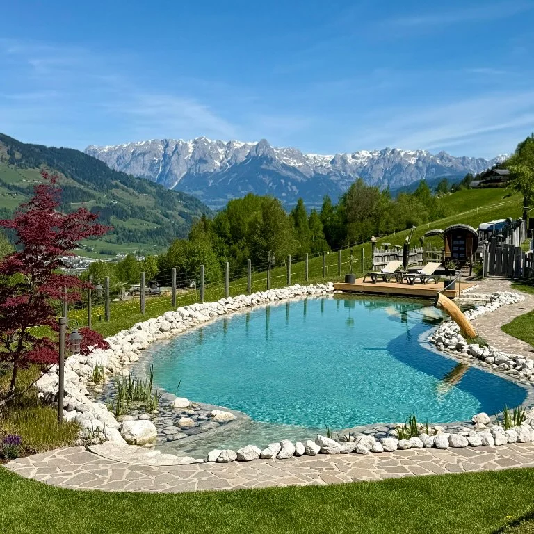 Organic swimming lake at the BERGHERZ chalet village